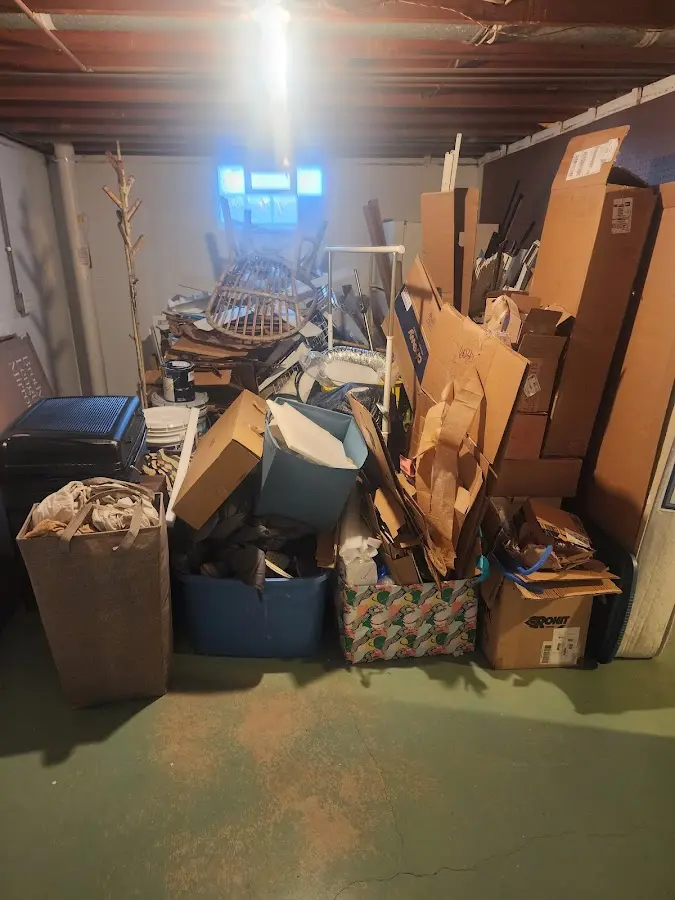 Roll-off dumpster container at job site for 20 Yard Dumpster Rental in Sand Lake